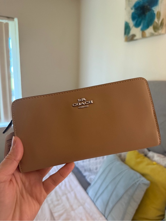Coach Handbags - Coach Zip-Around Leather Wallet in Tan